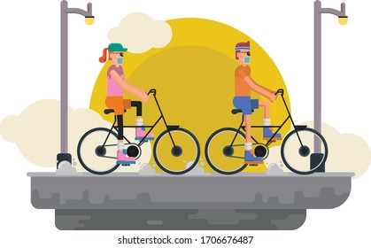Man and woman are cycling together