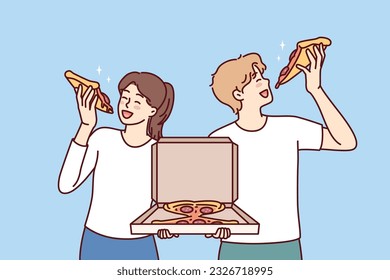 Man and woman eat pizza holding box of italian snacks and satisfying hunger together with fast food delivered from restaurant. Couple ordering pizza in pizzeria having lunch with pleasure