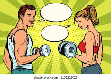 Man and woman in the gym with dumbbells. Pop art retro vector illustration cartoon comics kitsch drawing