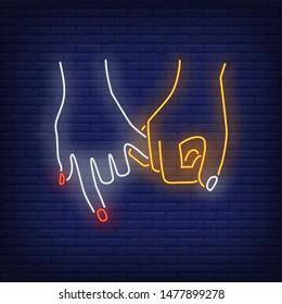 Man and woman hands holding little fingers neon sign. Friendship, love, advertisement design. Night bright neon sign, colorful billboard, light banner. Vector illustration in neon style.