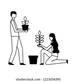 man and woman holding potted plants