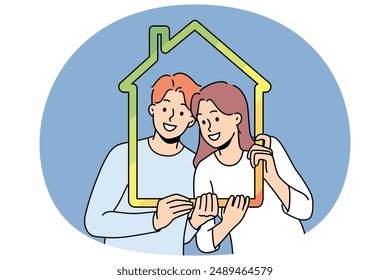 Man and woman with house outline symbolizing family property and sustainable energy efficient housing. Young couple recommends taking out mortgage or insuring house to avoid possible problems