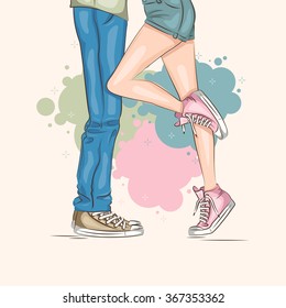 Man and woman legs with sneakers .