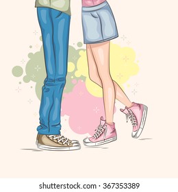 Man and woman legs with sneakers .
