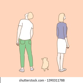 The man and woman are looking up with dog. Hand drawn style vector design illustrations.