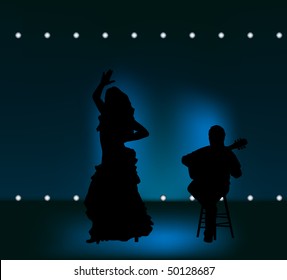 man and woman performing flamenco on stage