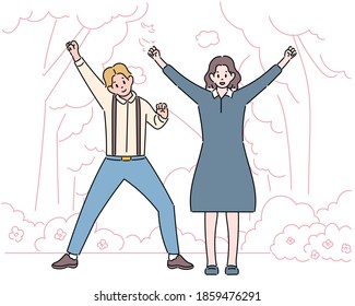 The man and the woman are raising their hands and cheering. hand drawn style vector design illustrations. 