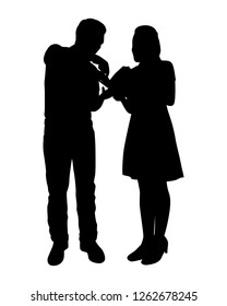 A man and a woman are reading book together silhouette vector