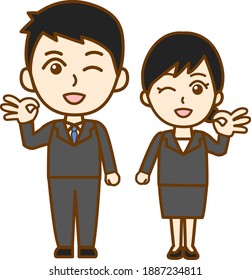 A man and a woman in recruit suits with OK gestures