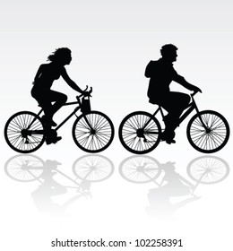 man and woman riding a bicycle vector silhouette