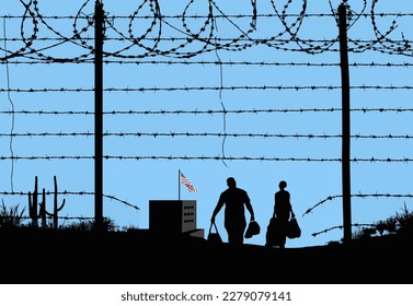 A man and woman are seen in silhouette after breaching a border fence on the southern border of the USA. They have gone through a broken barbed wire fence at mid-day. A USA flag can be seen in the dis