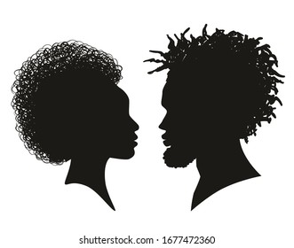 Man and woman silhouette face to face. Silhouettes of African American. Beautiful couple face in profile. 
