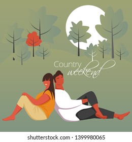 a man and a woman sit with their backs to each other. young couple in nature. appointment
