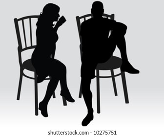 man and woman siting on chair