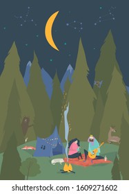 Man and woman sitting in camp near bonfire