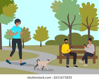 Man and woman sitting in the park, using cellphones, young woman jogging with a dog