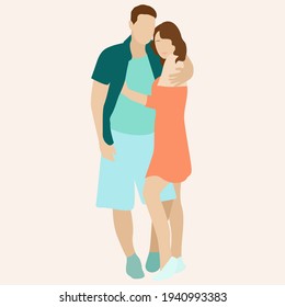 A man and a woman stand and embrace