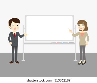 Man and woman standing beside a whiteboard