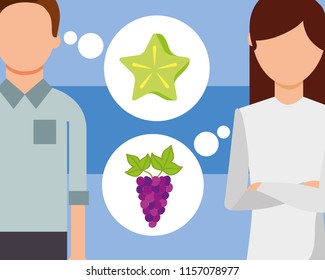 man and woman talking of fruits fresh carambola grapes