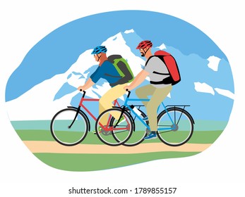 A man and a woman travel on bicycles against the backdrop of snow-capped mountains