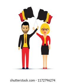 man and woman waving Belgium flags