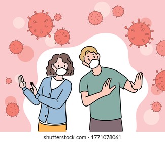 The man and the woman are wearing masks to stop the corona virus by hand. flat design style minimal vector illustration.