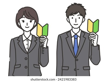 A man and a woman wearing suits with beginner marks
