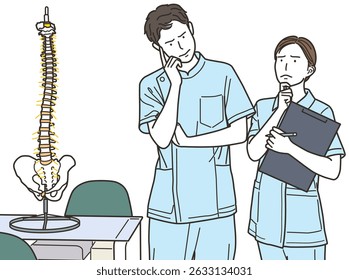 A man and woman who are chiropractors and are worried next to a spine model