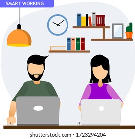 a man and woman work with their laptop from home in smartorking mode