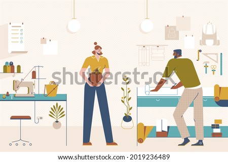 Man and woman working in a leather workshop. Sewing bags, backpacks and wallets. African craftsman in tannery . Design and manufacturing process. Creation of templates and drawings