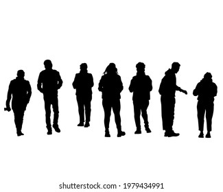 Man and women walking on street. Isolated silhouette on a white background