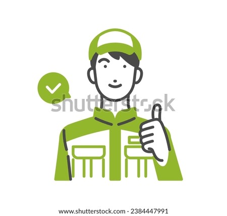 A man in work clothes giving a good sign