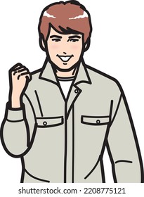 A man in work clothes posing ambitiously.