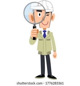 A man in work clothes wearing a helmet looking through a magnifying glass