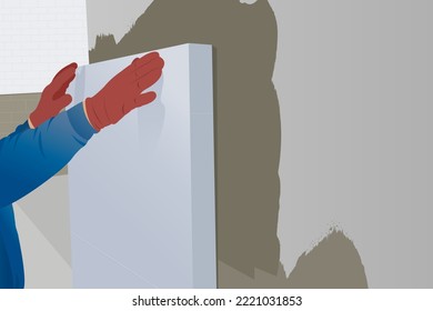 Man worker installs styrofoam heat insulation sheets on the facade wall of the house for thermal protection, home renovation.