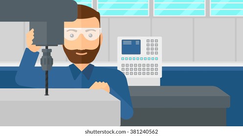 Man working with boring mill.