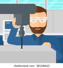 Man working with boring mill.