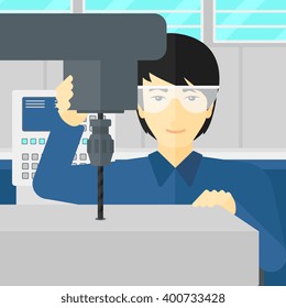 Man working with boring mill.