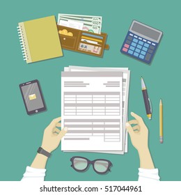 Man working with documents. Human hands hold the accounts, payroll, tax form. Workplace with papers, blanks, forms, phone with message, smart watches, wallet with money, credit cards. Top view Vector