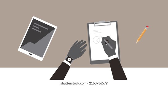 Man working hard, writing something on the paper