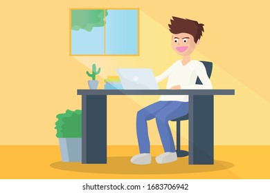 A man working at her desk at home. Man working with laptop at her work desk with light ray from window.