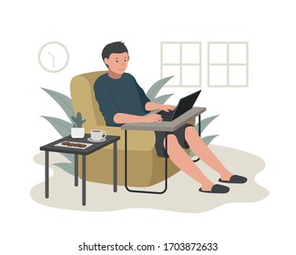 Man working with his laptop on the sofa at home