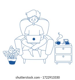 a man working at home and sitting on a sofa. Working at home with a cup of coffee