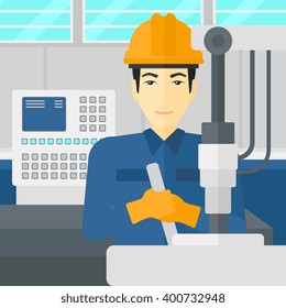 Man working with industrial equipment.