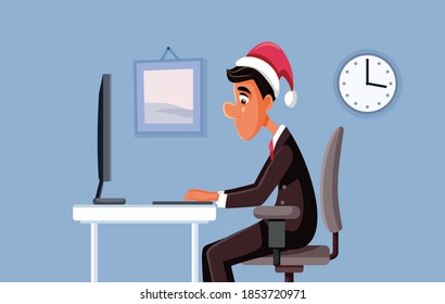 Man Working at the Office on Christmas. Businessman doing some overtime work on Xmas eve

