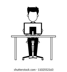 Man working on computer in black and white