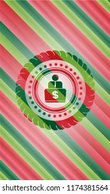 man working on computer icon inside christmas style emblem.