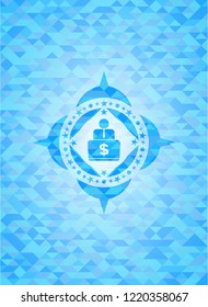 man working on computer icon inside light blue mosaic emblem