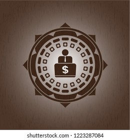 man working on computer icon inside wood emblem. Vintage.
