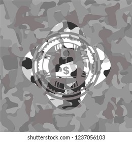 man working on computer icon on grey camouflaged pattern